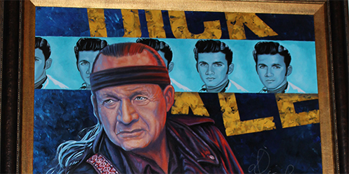 Painting of Dick Dale hanging in Refuge Brewery